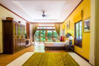 Postel nebo postele na pokoji v ubytování Rabbit Resort Pattaya