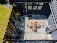 Patio alebo iná vonkajšia časť ubytovania UROCZY ZAKĄTEK - Apartamenty z własnymi tarasami i grillem w centrum Zatora, blisko Energylandii