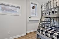 The Alpine Escape by Samsara Resort Top View Downtown 4BR & 3BTHにあるベッド