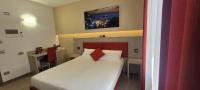 Posteľ alebo postele v izbe v ubytovaní Eden Rooms