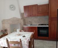 A kitchen or kitchenette at B&B Lo Scrigno del Salento