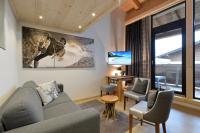TV a/nebo společenská místnost v ubytování Narzenhof Wellness Chalets, Familien & Luxus Apartments am Bauernhof