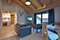 Kuchyň nebo kuchyňský kout v ubytování Narzenhof Wellness Chalets, Familien & Luxus Apartments am Bauernhof