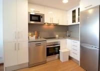 Kuchyň nebo kuchyňský kout v ubytování Front Mar - apartamentos