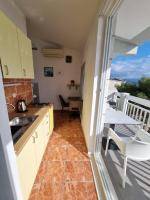 Kuchyňa alebo kuchynka v ubytovaní Apartmani Apollo - Drasnice