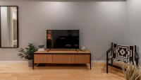 TV a/nebo společenská místnost v ubytování Belomonte 103 by LovelyStay