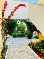 A garden outside Sunflower Apartments & Studios