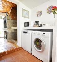 Kuchyň nebo kuchyňský kout v ubytování GALIHOST - A Casa do Olivo