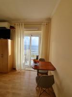 Televízia a/alebo spoločenská miestnosť v ubytovaní Apartmani Apollo - Drasnice