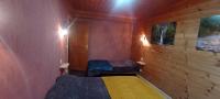 Ein Bett oder Betten in einem Zimmer der Unterkunft Chalet les Alpes - Le Sapey
