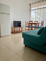 TV a/nebo společenská místnost v ubytování Las Piteras Bungalows