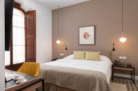 Hotel Can Quetglasにあるベッド