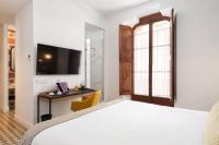 Hotel Can Quetglasにあるテレビまたはエンターテインメントセンター