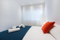 Postel nebo postele na pokoji v ubytování LOS BOLICHES 2ND LINE BEACH APARTMENT