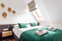 Posteľ alebo postele v izbe v ubytovaní Apartament Leśna Łąka Zakopane