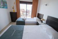 Postel nebo postele na pokoji v ubytování TORREMAR 17-E Levante Beach