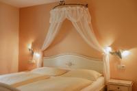 Posteľ alebo postele v izbe v ubytovaní Schlössl Hotel Kindl