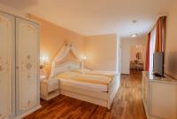 Posteľ alebo postele v izbe v ubytovaní Schlössl Hotel Kindl