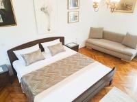 Postel nebo postele na pokoji v ubytování Apartments Villa Rosa