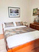 Postel nebo postele na pokoji v ubytování Apartments Villa Rosa
