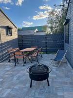 Patio alebo iná vonkajšia časť ubytovania Domki Letniskowe Zacisze Łeba