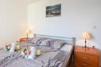 Postel nebo postele na pokoji v ubytování Lulak Studio Apartments
