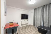 TV a/nebo společenská místnost v ubytování Los Cristianos - San Telmo piscina y vistas mar 1