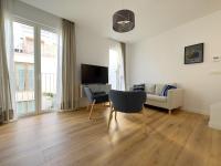 Televízia a/alebo spoločenská miestnosť v ubytovaní JUAN DE AUSTRIA Duplex Penthouse 4PAX