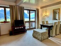 Telewizja i/lub zestaw kina domowego w obiekcie Haus Wenger Mountain View & Swimming Pool