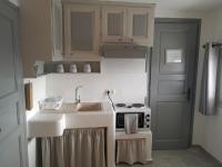 A kitchen or kitchenette at Sunny Guest House New Port Mykonos