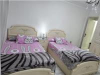 Postel nebo postele na pokoji v ubytování Unique Apartment in Sheraton Heliopolis