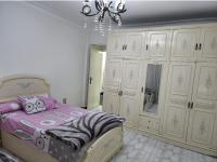 Postel nebo postele na pokoji v ubytování Unique Apartment in Sheraton Heliopolis