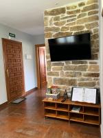 TV a/nebo společenská místnost v ubytování Villas Vairocana