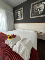 Postel nebo postele na pokoji v ubytování Villas Vairocana