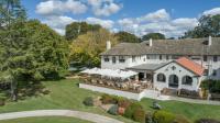 an aerial view of a large white house at Dormie House in Moss Vale