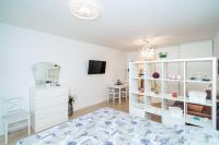 Posteľ alebo postele v izbe v ubytovaní Lenka Apartment