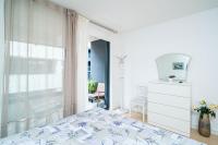Posteľ alebo postele v izbe v ubytovaní Lenka Apartment
