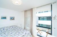 Posteľ alebo postele v izbe v ubytovaní Lenka Apartment