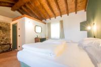 A bed or beds in a room at Ca' di Martino