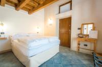 A bed or beds in a room at Ca' di Martino