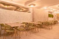 Reštaurácia alebo iné gastronomické zariadenie v ubytovaní The Valentia Corretgería
