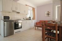 Kuchyň nebo kuchyňský kout v ubytování Kasianni Apartments by Hotelius