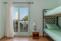 Postel nebo postele na pokoji v ubytování Spyros House, 3 bedrooms-sea view-in Agia Efimia