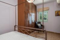 Postel nebo postele na pokoji v ubytování Spyros House, 3 bedrooms-sea view-in Agia Efimia