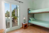 Postel nebo postele na pokoji v ubytování Spyros House, 3 bedrooms-sea view-in Agia Efimia
