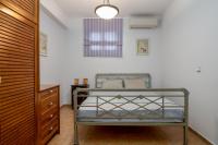 Postel nebo postele na pokoji v ubytování Spyros House, 3 bedrooms-sea view-in Agia Efimia