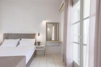 Postel nebo postele na pokoji v ubytování Keti Apartments