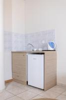 Kuchyň nebo kuchyňský kout v ubytování Keti Apartments