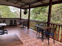 Balkón nebo terasa v ubytování Curuba Lodge