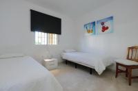 Postel nebo postele na pokoji v ubytování Spacious apartment Puerto Alto